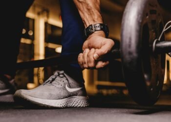 person about to lift barbell